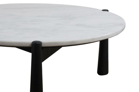 Round coffee table featuring a smooth white marble top with subtle gray veining, supported by sleek black mango wood legs.