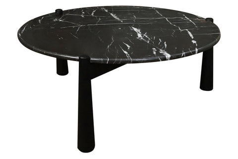 Round coffee table featuring a striking black marble top with white veining, supported by sturdy black mango wood legs.