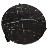 Round coffee table featuring a striking black marble top with white veining, complemented by sleek black mango wood legs.