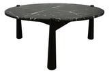 Round coffee table featuring a striking black marble top with white veining, supported by three sturdy black mango wood legs.