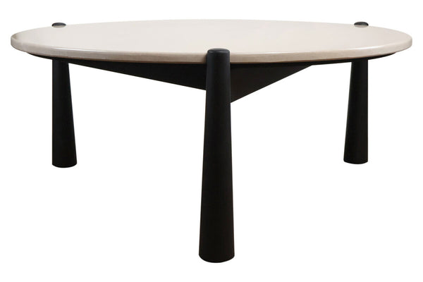 Cream marble top coffee table with a sleek, rounded surface, supported by four sturdy black mango wood legs.