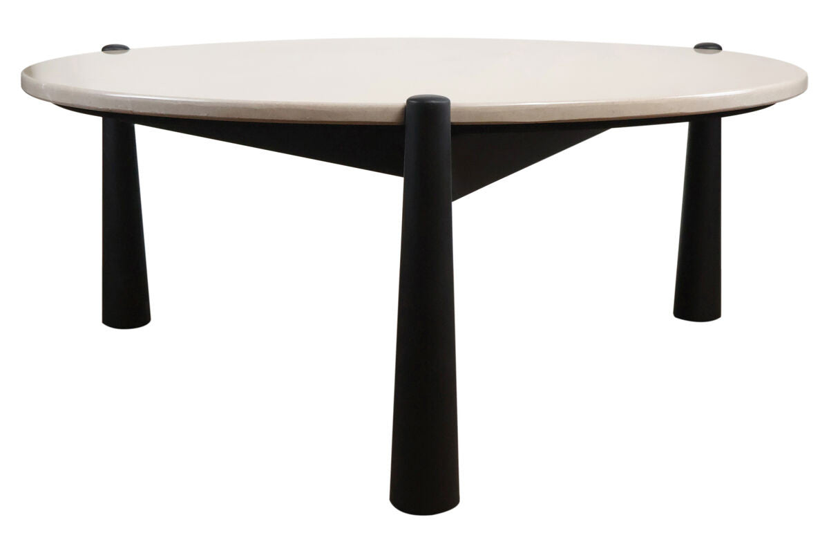 Cream marble top coffee table with a sleek, rounded surface, supported by four sturdy black mango wood legs.