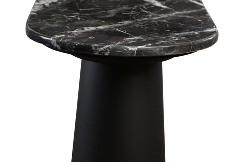 Black and white marble top console table featuring a smooth, rounded edge and a sleek, cylindrical mango wood base.