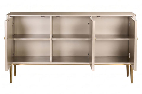 Three-door sideboard featuring a sleek gold finish with flute detailing on the doors.