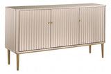 Elegant sideboard featuring three doors with a distinctive flute detail, finished in a soft gold hue. The piece is supported by slender, tapered legs in a matching gold tone.