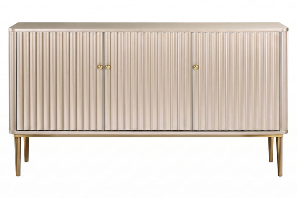 Three-door sideboard featuring a sleek design with vertical flute detailing, finished in a soft gold hue.