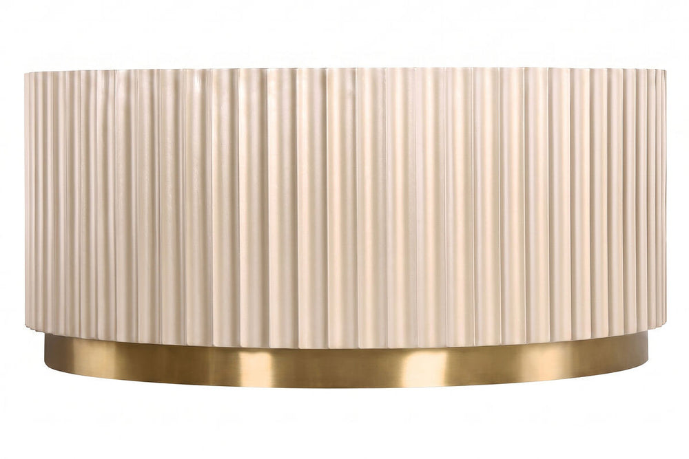 Round coffee table featuring a textured, fluted design in a soft beige color, complemented by a sleek gold stainless steel base.