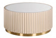 Round coffee table featuring a fluted design in a soft beige color, complemented by a sleek mirrored top. The base is adorned with a shiny gold trim, adding a touch of elegance.