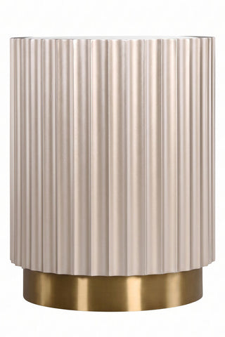 Elegant side table featuring a glass top and a textured, fluted design in a soft beige hue. The base is finished in a polished gold tone, adding a touch of luxury.