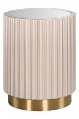Round side table featuring a glass top and a fluted design in a soft beige color, complemented by a sleek gold base.