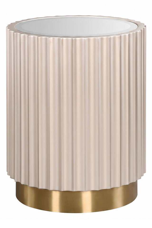 Round side table featuring a glass top and a fluted design in a soft beige color, complemented by a sleek gold base.