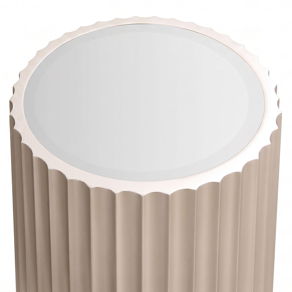 Gold side table featuring a glass top and a fluted design. The table has a scalloped edge around the top and a smooth, reflective surface.