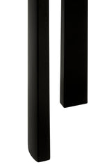 Close-up view of the black acacia wood legs of a console table, showcasing the smooth finish and clean lines.