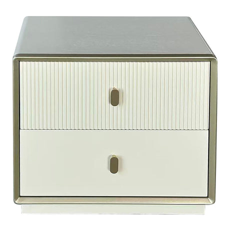 Cream-colored bedside table featuring two drawers with a ribbed design on the top drawer and a smooth finish on the bottom drawer.