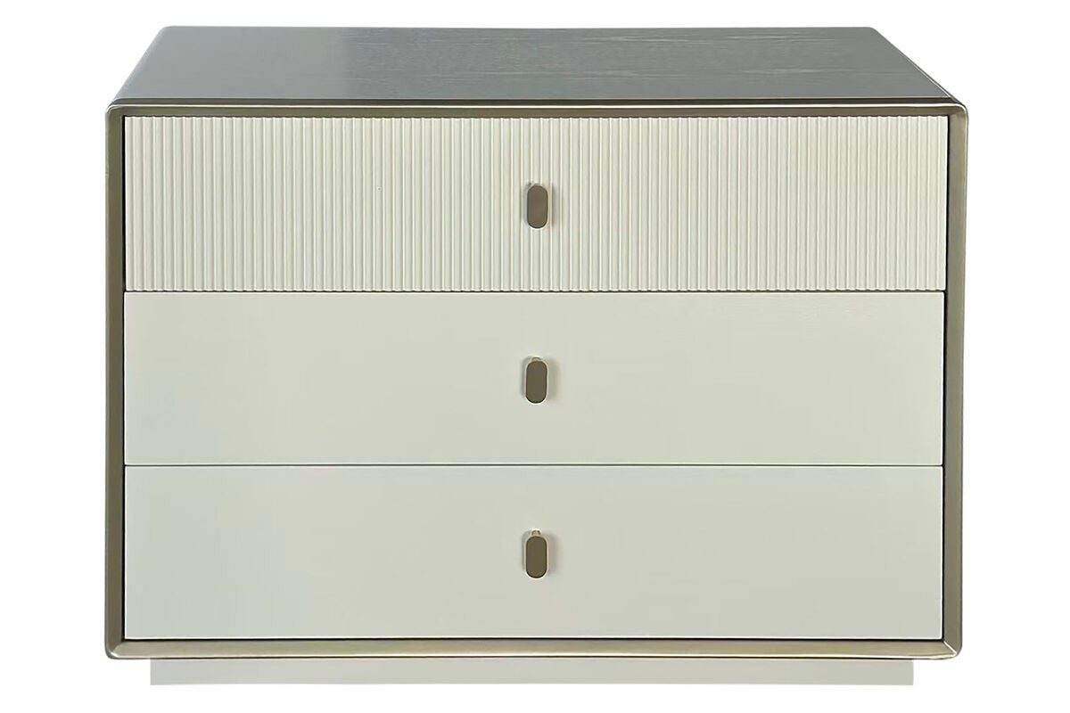 Three-drawer chest featuring a sleek ivory wood veneer finish with a textured ribbed design on the top drawer.