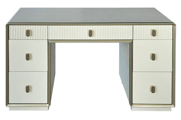 Cream-colored dressing table featuring seven drawers with a mix of smooth and ribbed fronts. The table has a sleek design with a subtle metallic trim and round handles.