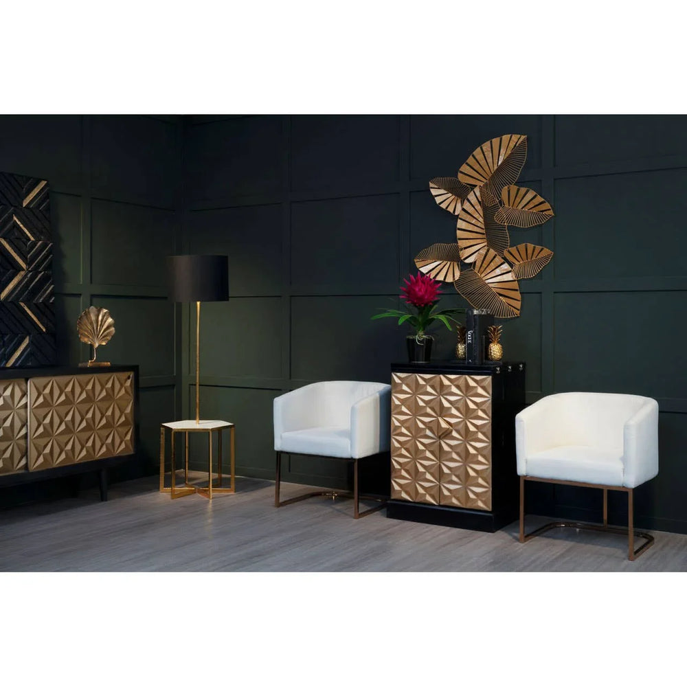 Gold geometric sideboard and cabinet, two white armchairs, black floor lamp in modern room