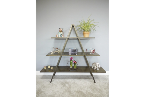 Three-tier metal display shelves in an A-frame design with decorative items, against a gray wall.