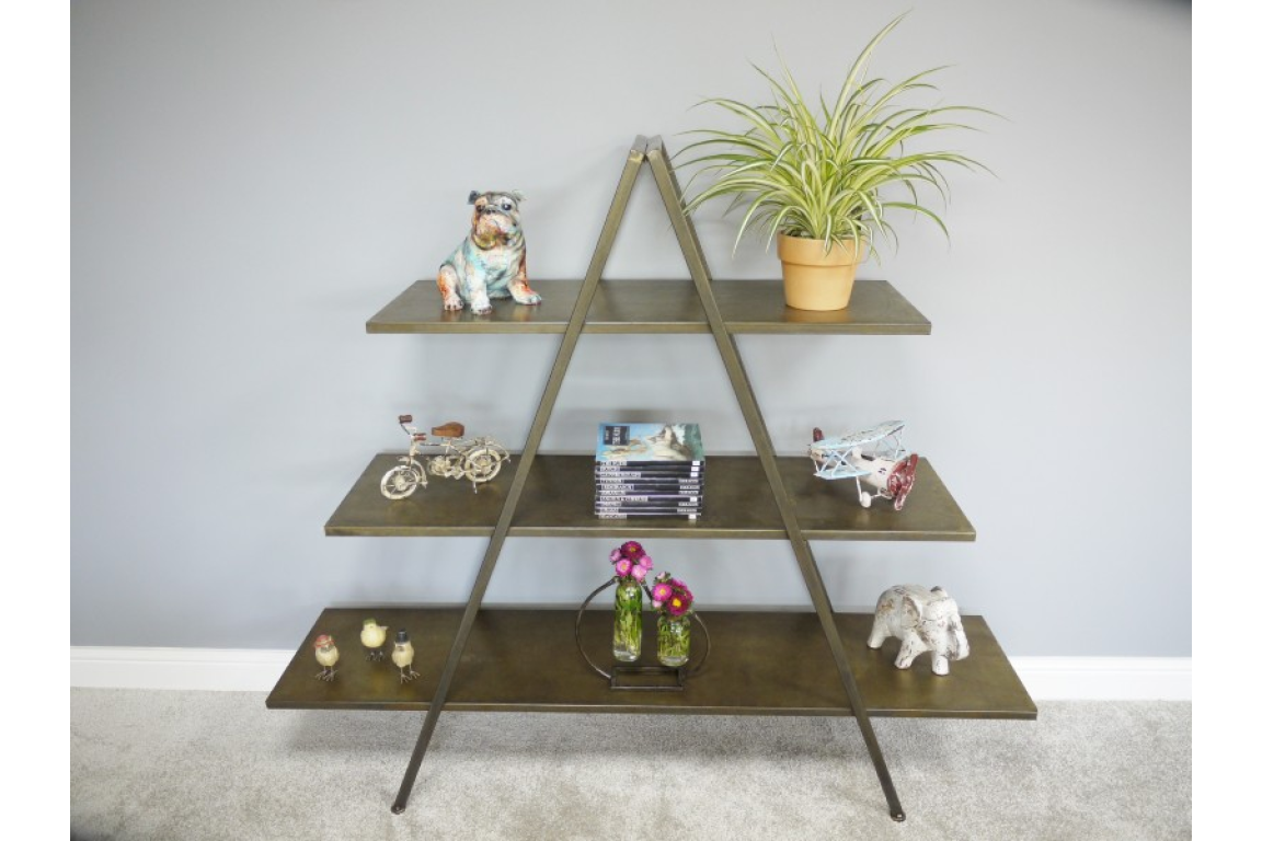 Metal A-frame display shelves with three brown shelves holding decorative items against a gray wall.
