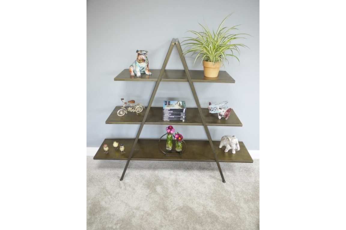 Three-tier A-frame display shelves in dark metal with decorative items, against a light grey wall and carpeted floor.
