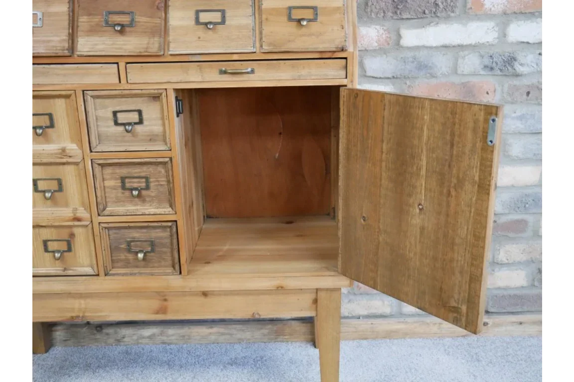 Rustic wooden sideboard with open cupboard door and small storage drawers