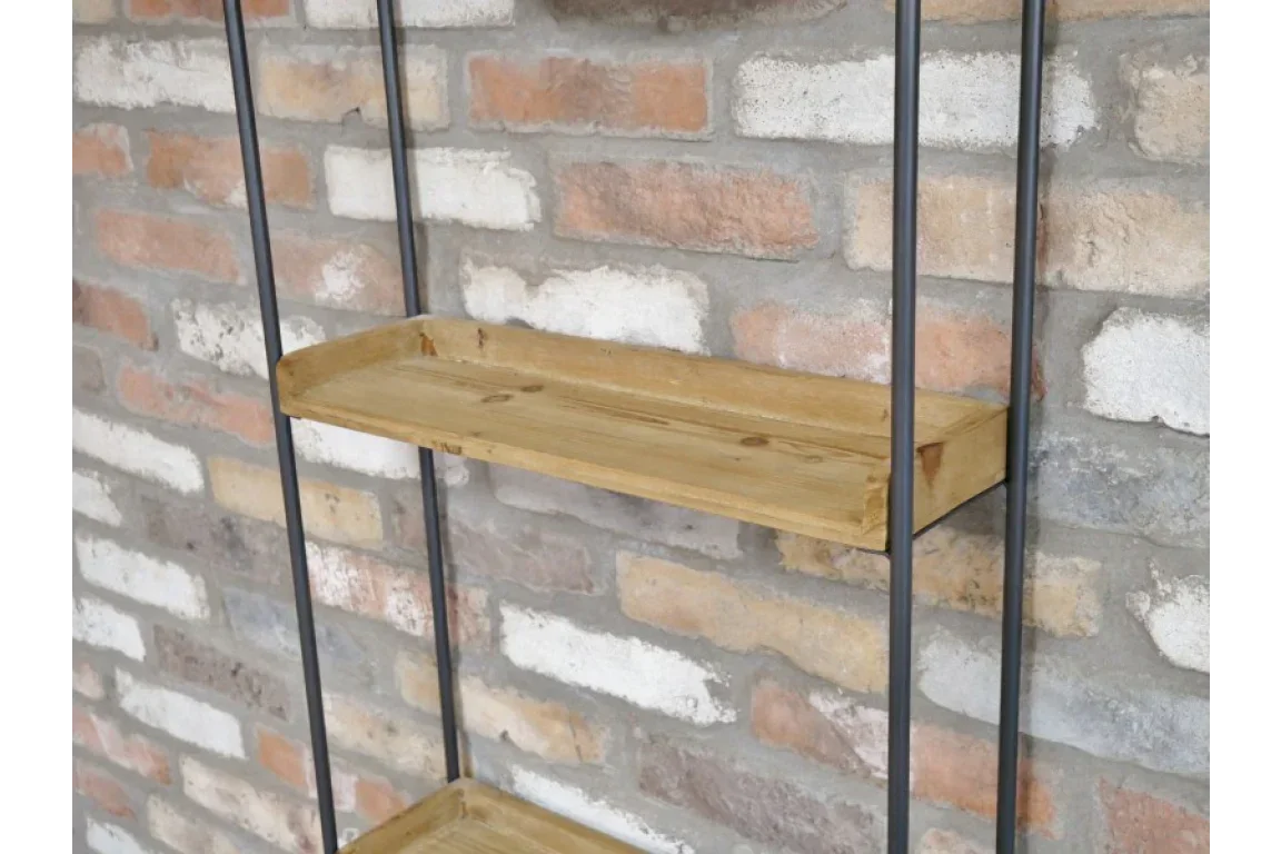 Industrial wood and metal shelving unit with tray shelves against exposed brick wall