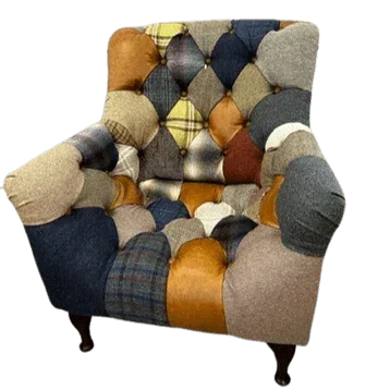Patchwork fabric armchair with button-tufted backrest and dark wooden legs