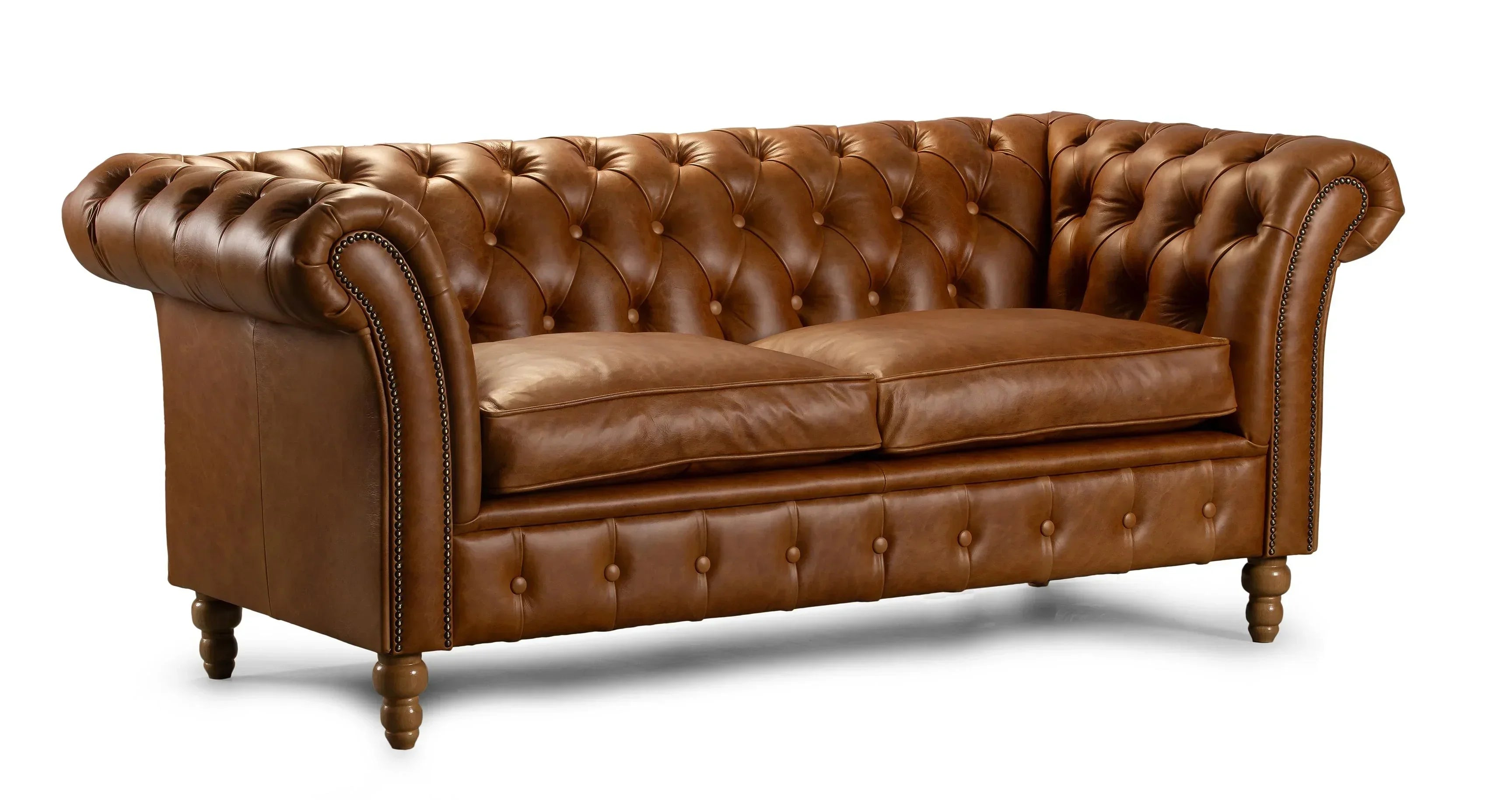 Brown leather Chesterfield sofa with deep button tufting and rolled arms