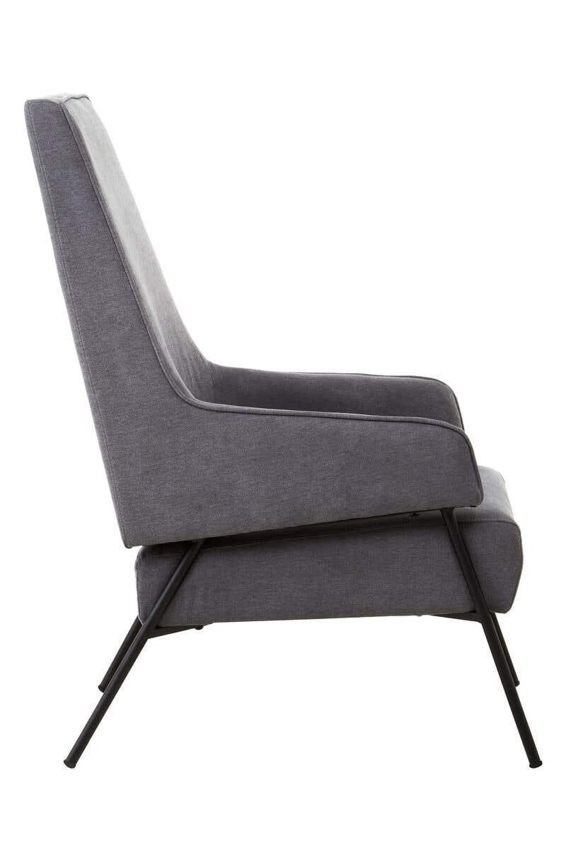 Side view of grey fabric armchair with slim black metal legs