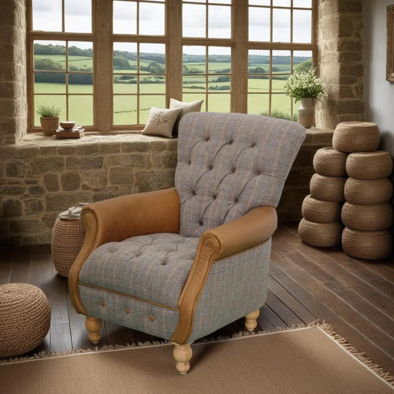 Tufted armchair with brown leather arms and fabric upholstery in rustic living room