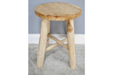 Round wooden stool with three legs and cross support, light natural wood finish, front angle on carpeted floor.