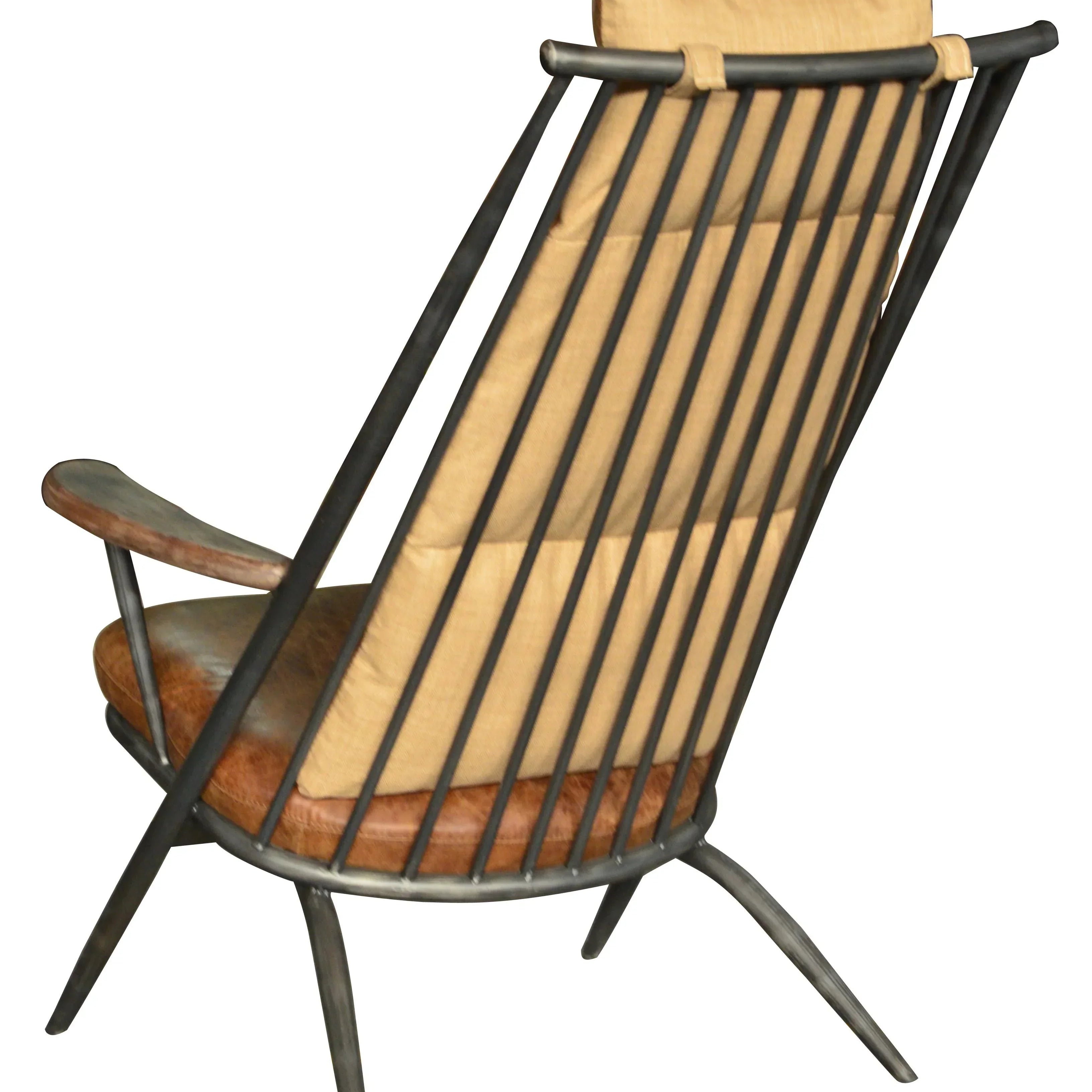 Modern accent chair with metal frame, tan cushioned seat and back, angled rear view