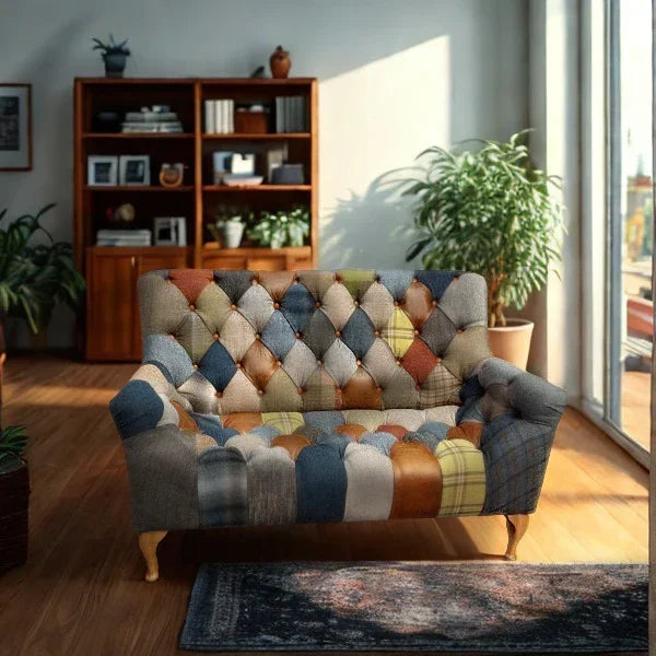 Patchwork fabric sofa with button tufting in living room, wooden legs, large window nearby