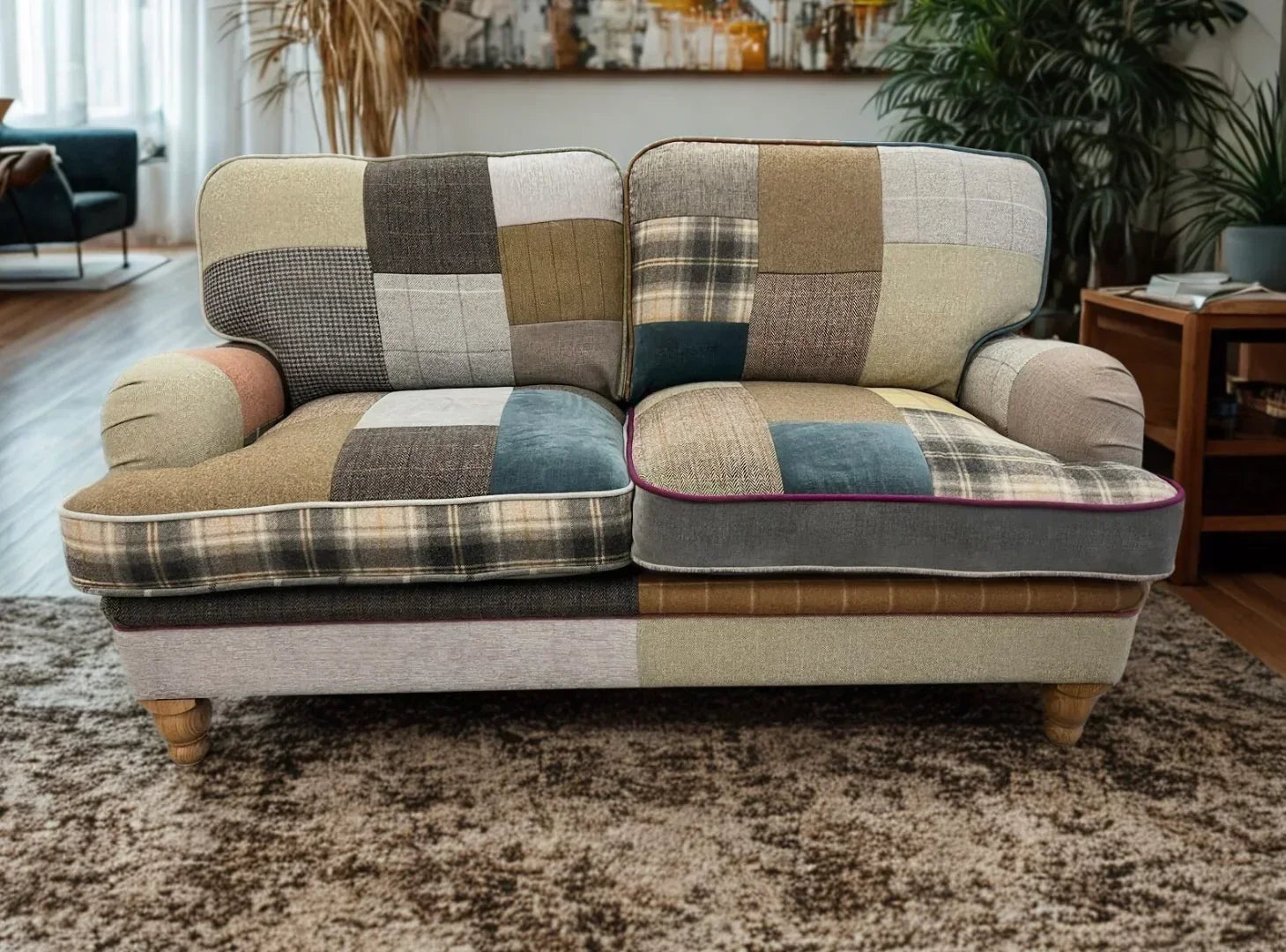 Patchwork fabric sofa with wooden legs in modern living room setting