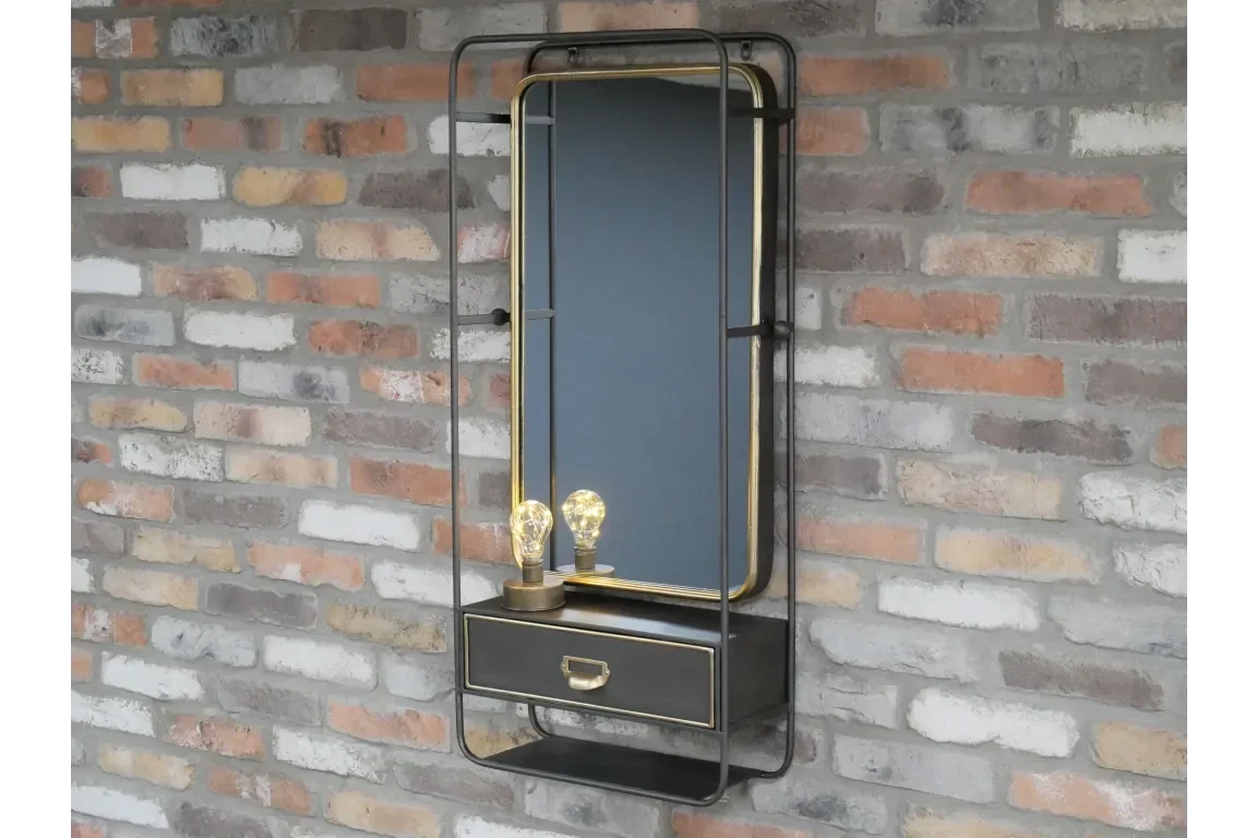 Industrial hallway mirror with black metal frame, drawer, and two bulb lights mounted on brick wall