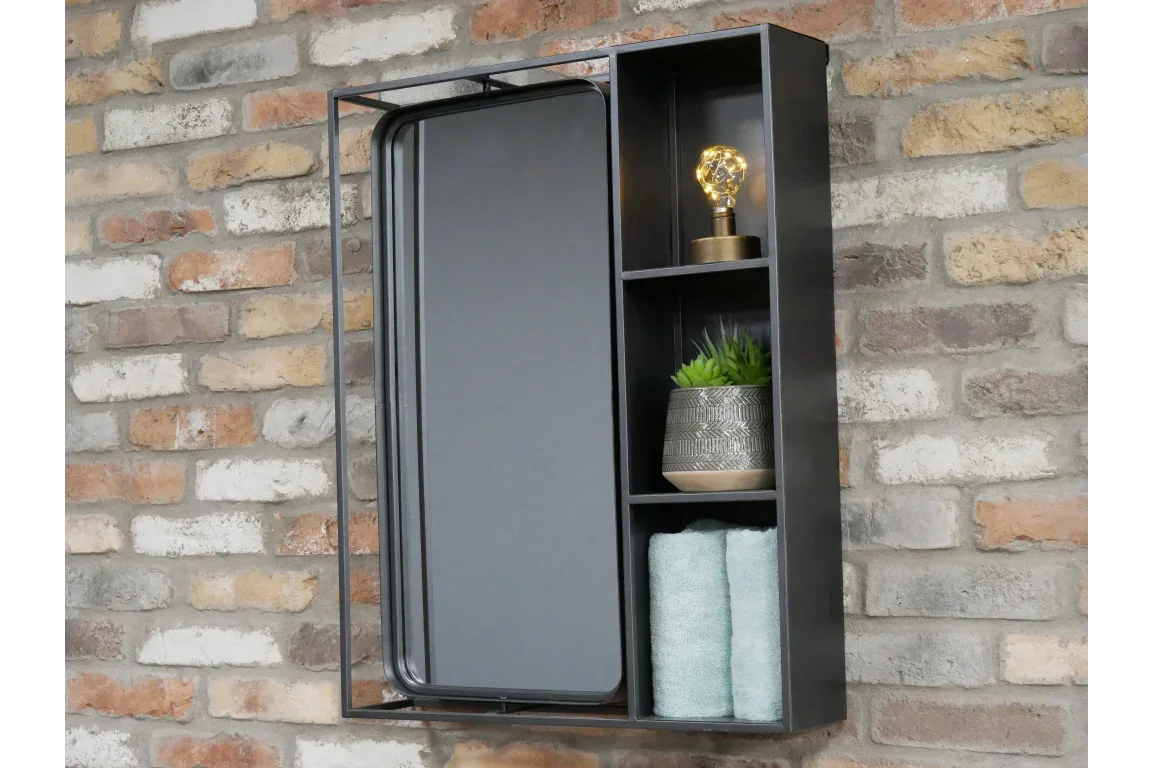 Black metal wall cabinet with mirror, open shelves, towels, lamp and plant decor