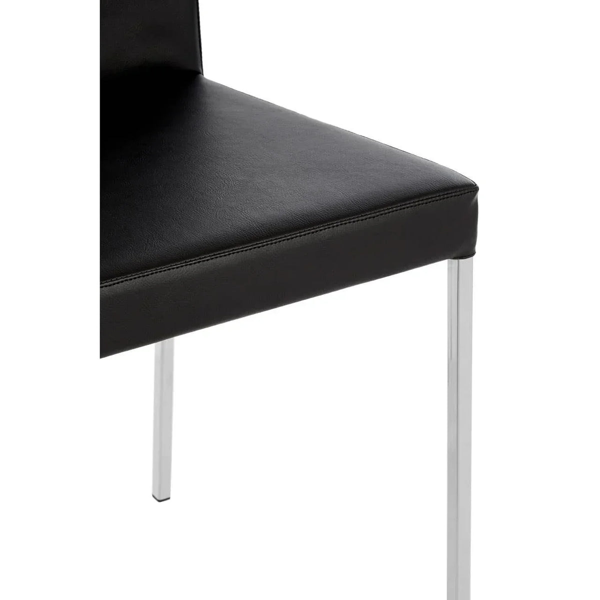 Black faux leather dining chair with chrome metal legs, close-up of seat and frame