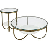 Round glass and marble tables with antique gold iron frames.