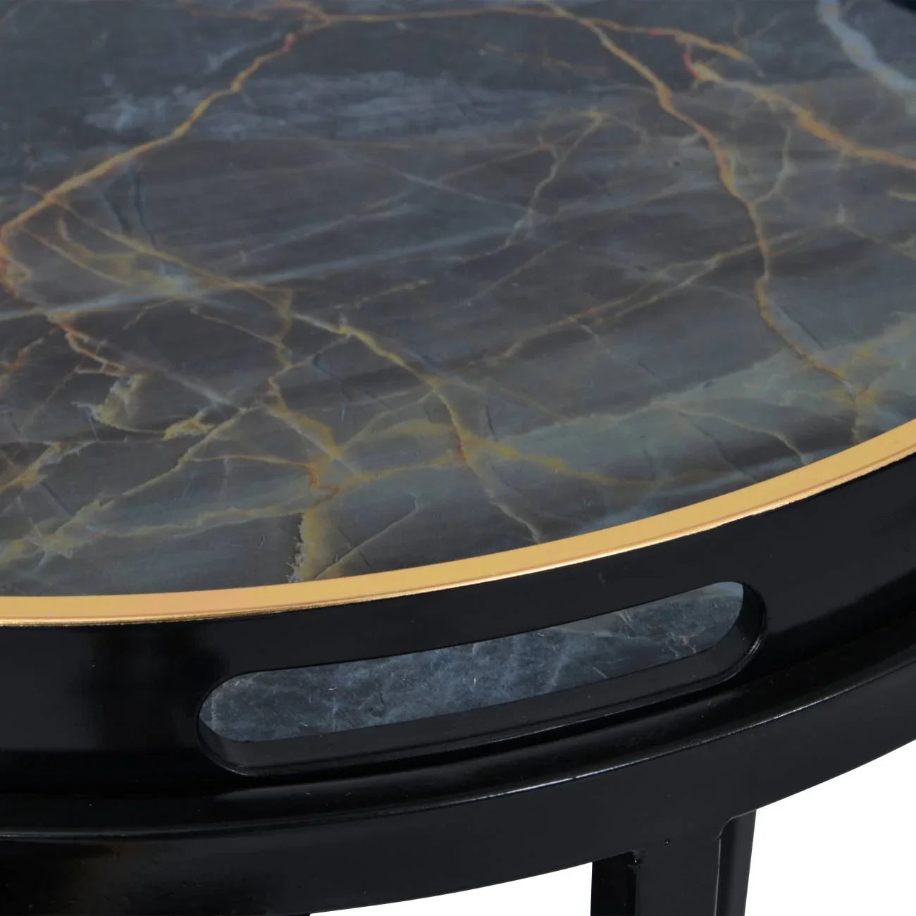 Black and gold tray table with marble-like surface detail.