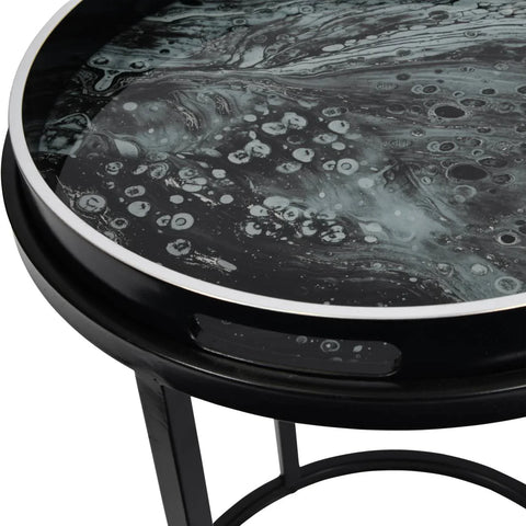 Black tray table with swirling monochrome pattern and sleek metal edge.