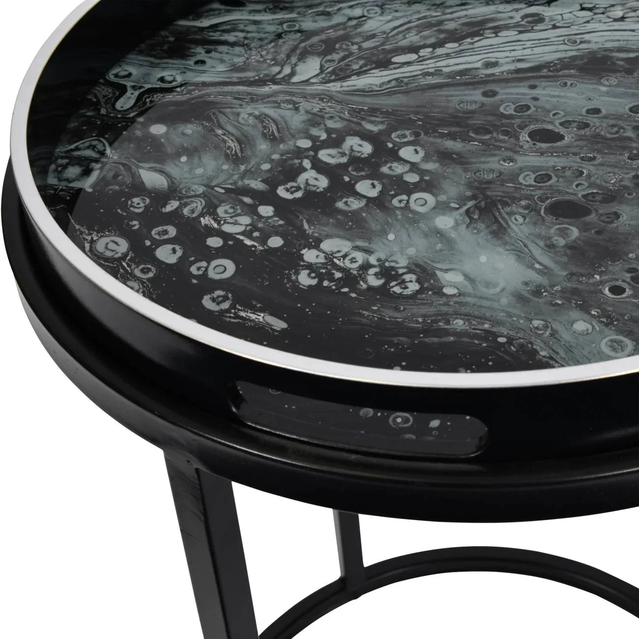 Black tray table with swirling monochrome pattern and sleek metal edge.