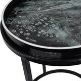 Black tray table with swirling monochrome pattern and sleek metal edge.