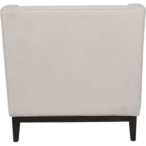 Ivory fabric armchair back view with dark wooden legs