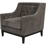 Warm grey armchair with buttoned backrest and dark wooden legs.
