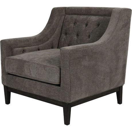 Warm grey armchair with buttoned backrest and dark wooden legs.