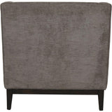 Back view of grey fabric armchair with dark wooden legs.