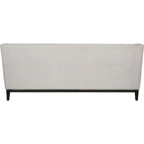 Back view of ivory fabric sofa with dark wooden legs