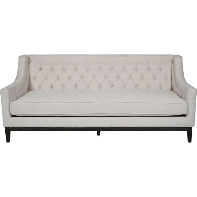 Ivory fabric sofa with buttoned backrest and sleek black legs | Home Centre Direct UK