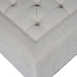 Ivory fabric stool corner with button-tufted detail