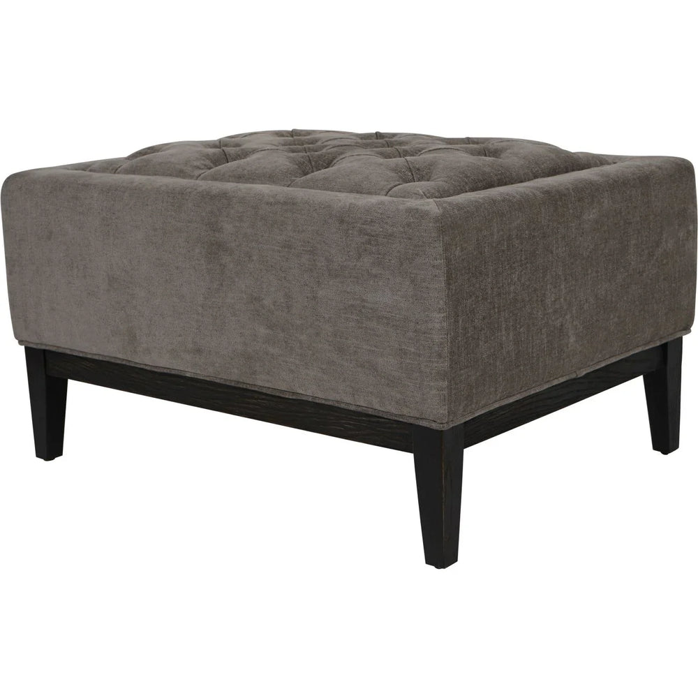 Warm grey fabric stool with buttoned top and dark wooden legs.